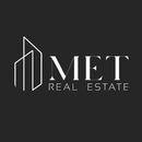 MET REAL ESTATE