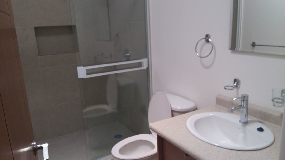 11 de 16: Baño compartido