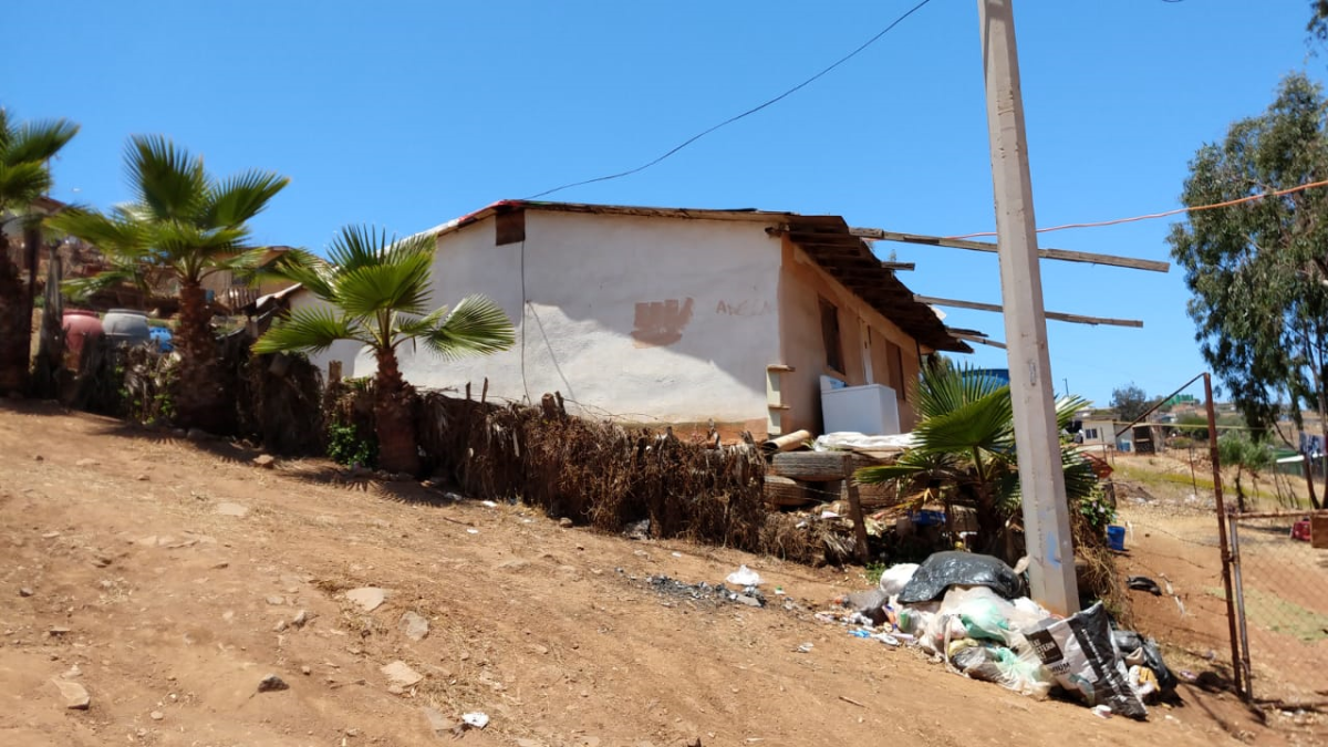 4 de 11: VISTA DE TERRENO Y CASA