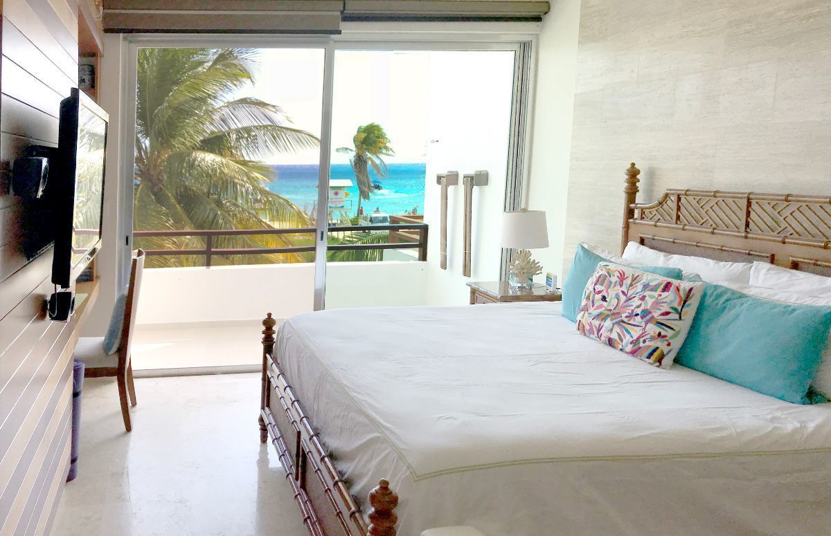 1 of 10: Ocean view and exquisitely furnished master bedroom. 