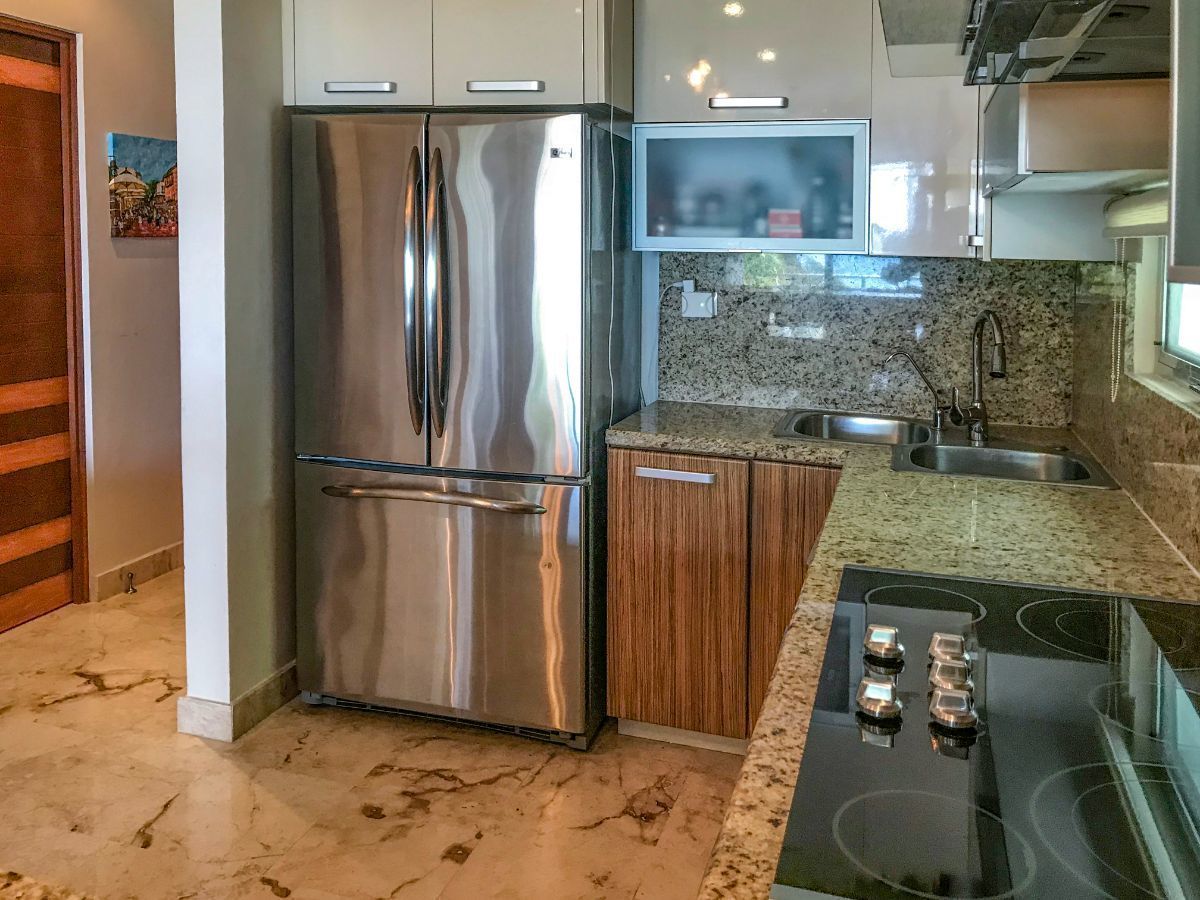 6 of 10: 18 feet steel refrigerator, electric stove, oven, dishwasher