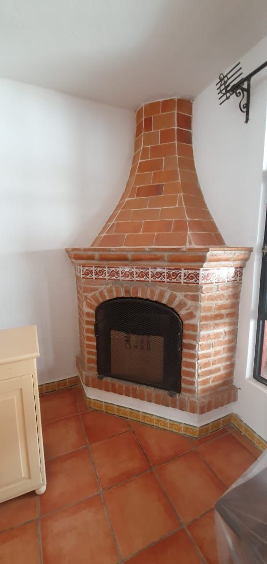 4 de 41: Chimenea de leña.