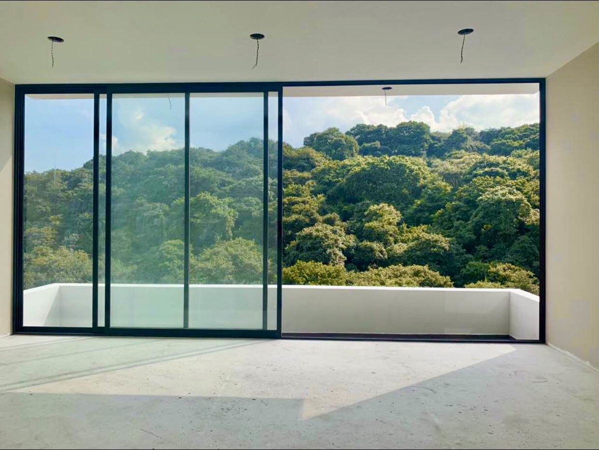 Vista desde el interior de la casa hacia el bosque, foto 7 de 27