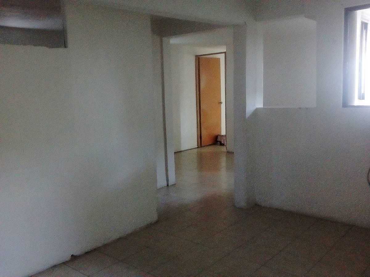 1 de 15: Ángulo de sala, con vista al comedor-cocina y recámara
