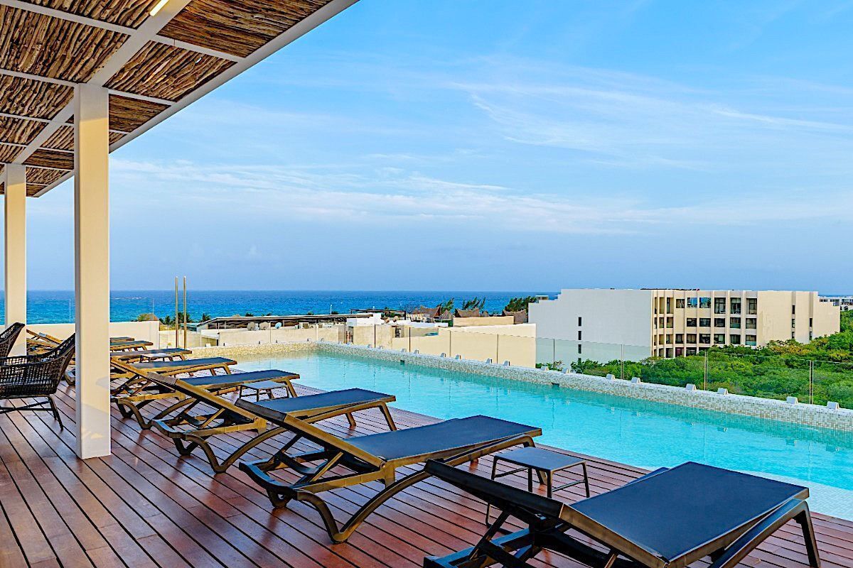 Condominio co amenidades entre la quinta avenida y el mar en Playa del Carmen