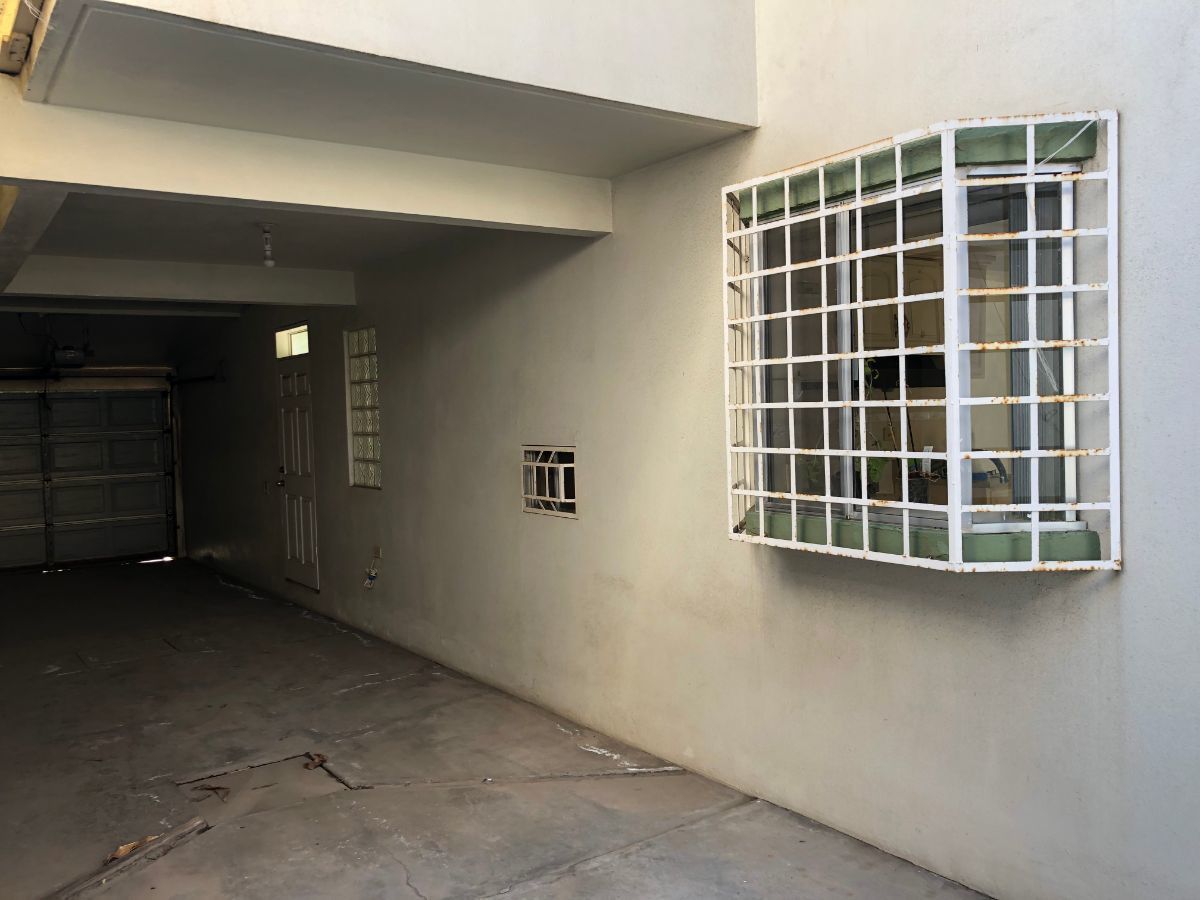 9 de 28: ESTACIONAMIENTO DESCUBIERTO