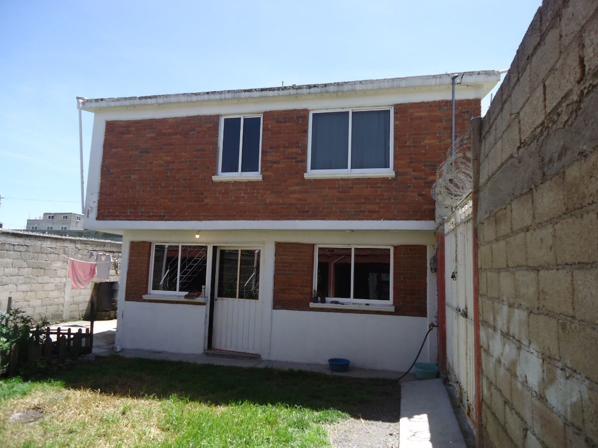 11 de 24: frente casa