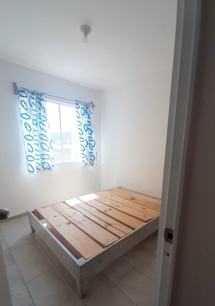 11 of 11: Recamara con cortinas