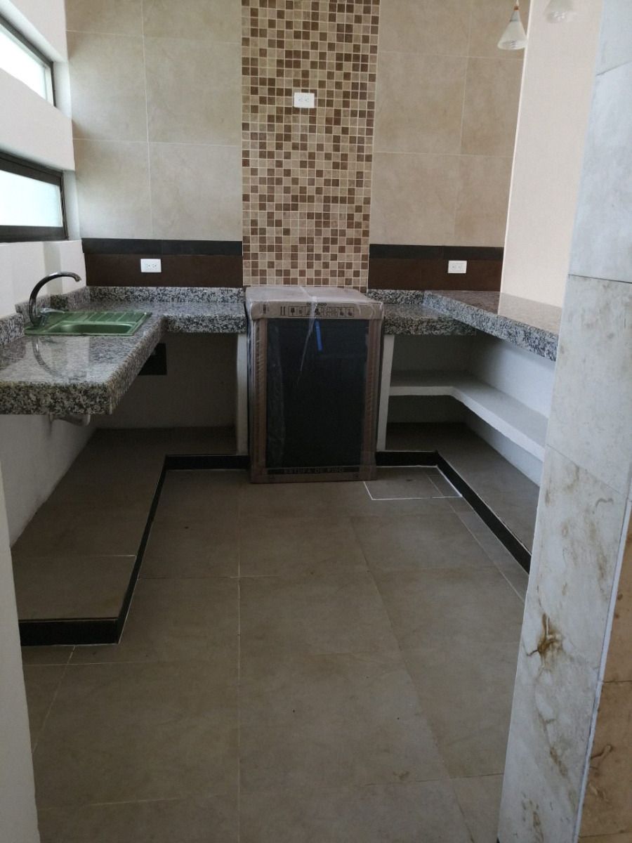 6 of 14: Alacenas y lavabo en marmol y granito