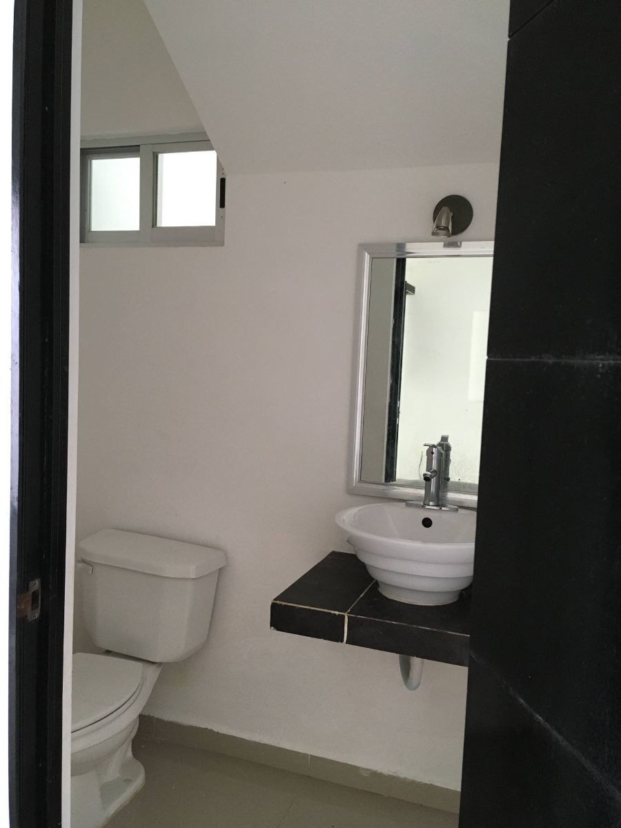 10 de 24: Medio baño
