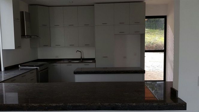 12 de 15: Cocina con cubierta de Granito