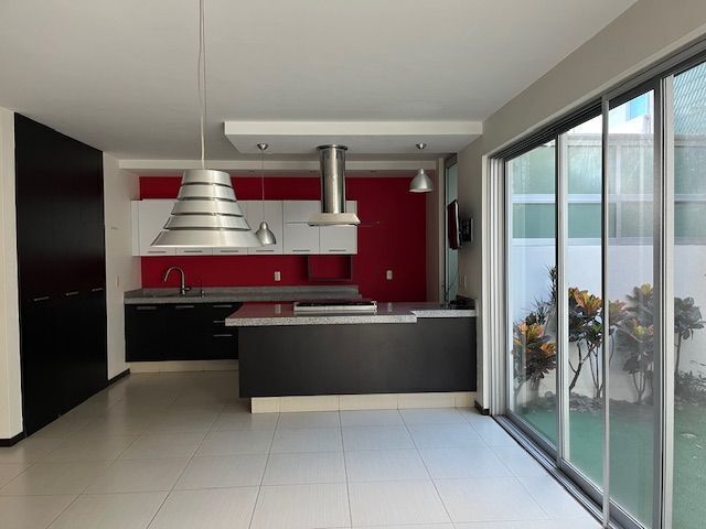 4 de 32: cocina integral abierta a sala comedor