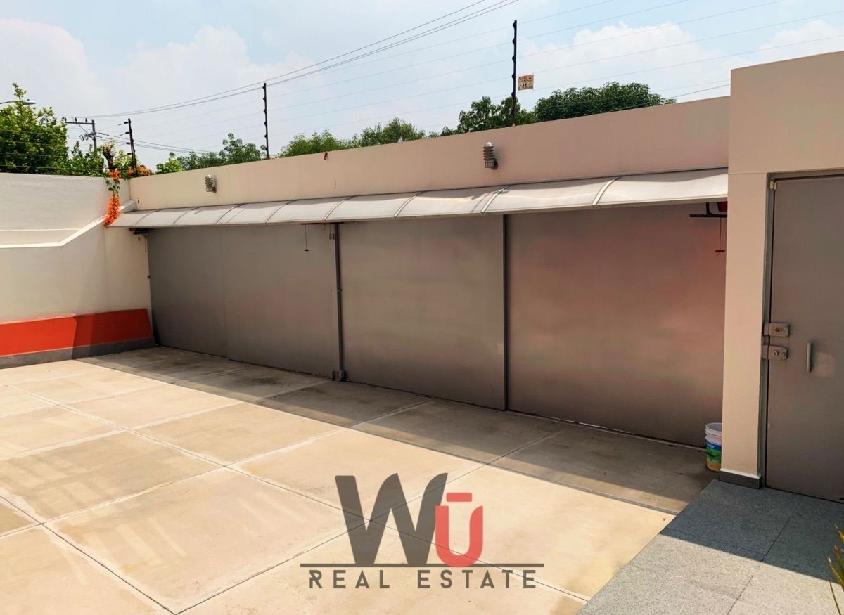 12 de 15: Garage para 4 autos con portón eléctrico 