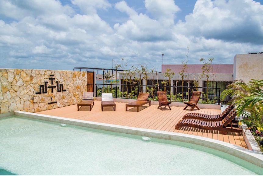 Loft en planta baja con jardin y alberca privada, albercas, salon de cine, area