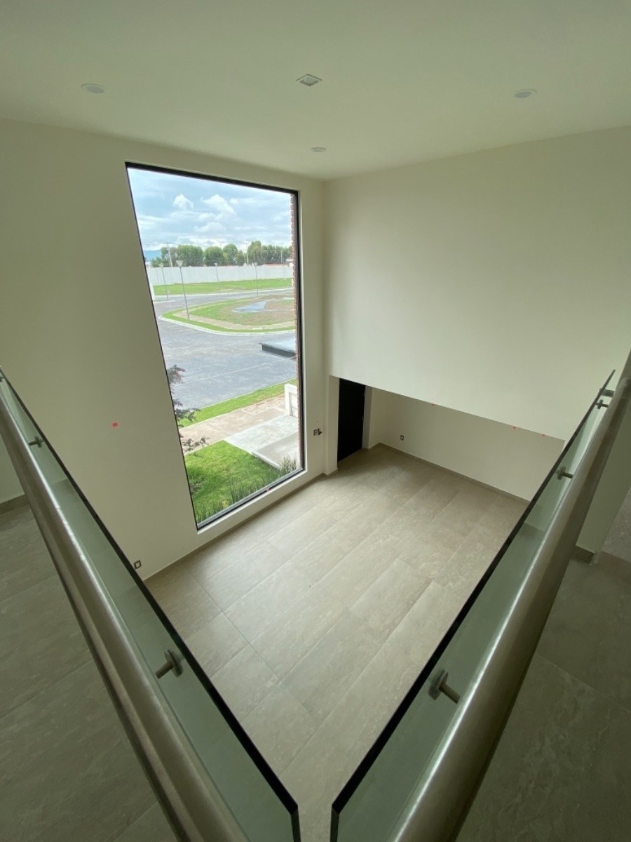 12 de 27: Sala a doble altura