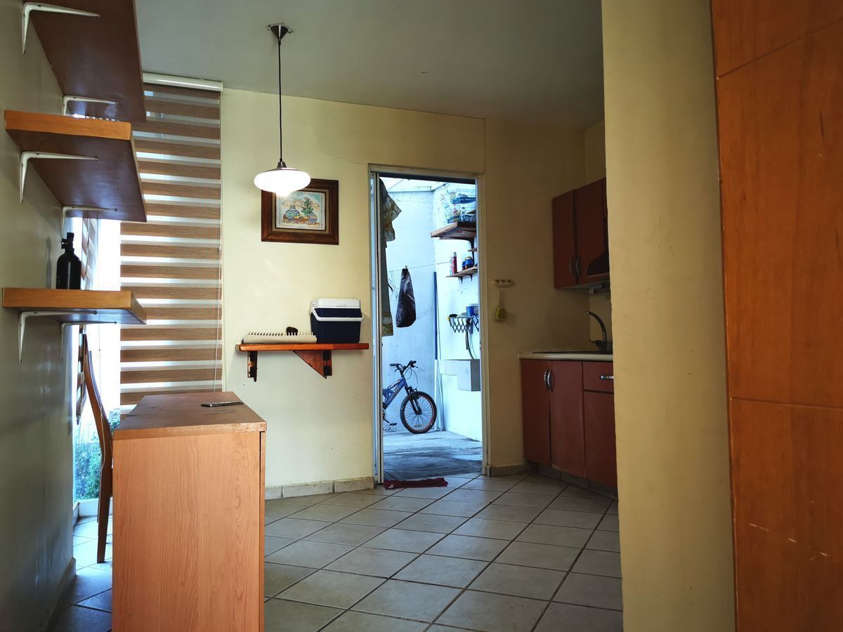 4 de 11: Cocina integral y equipada con estufa y  campana