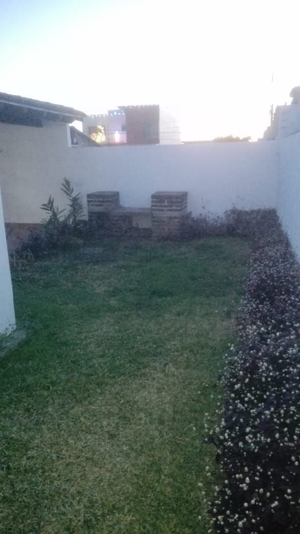2 de 5: Patio con terraza y cuarto de lavado