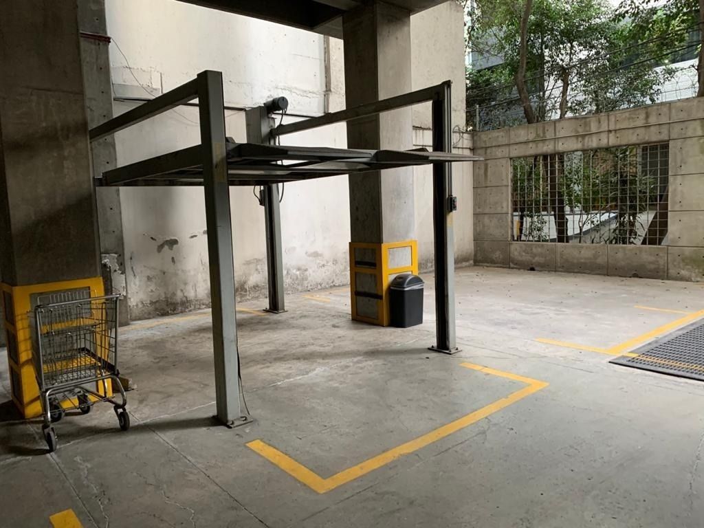 14 de 15: ESTACIONAMIENTO PARA DOS AUTOS CON ELEVADOR