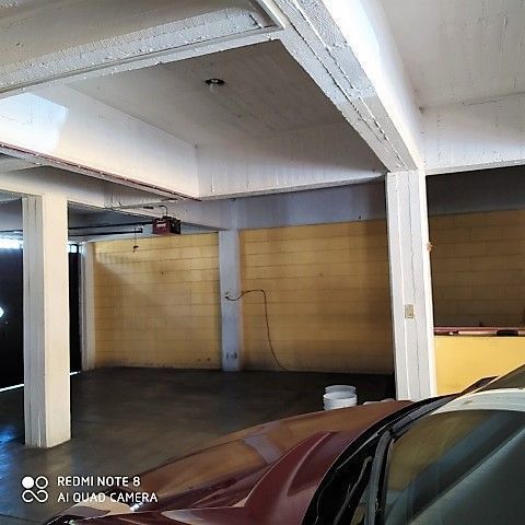 21 of 21: Estacionamiento techado