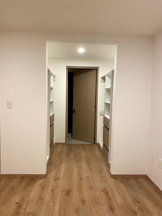 6 de 9: Vestidor Recámara Principal