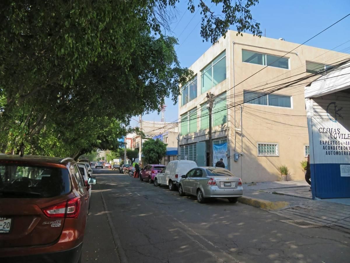 1 of 9: Edificio en la Calle donde se ubica 