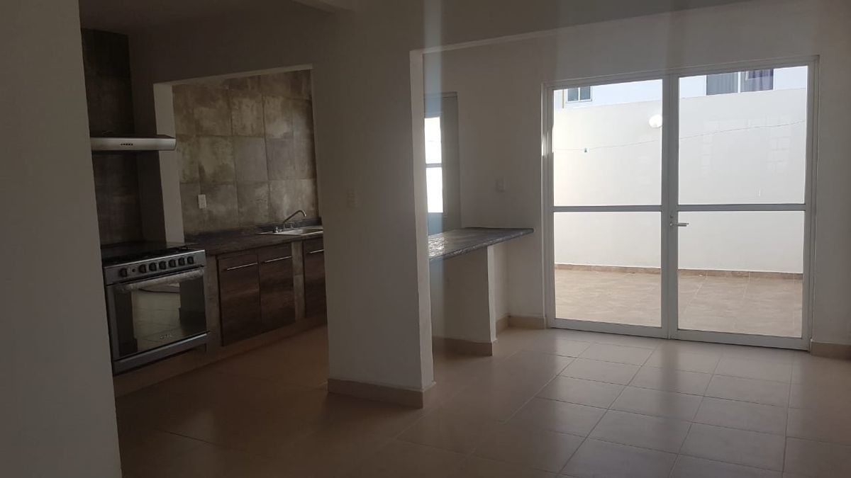3 de 13: Cocina, barra y comedor