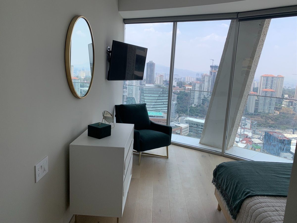 Main room, TV, balcony, Santa Fe views