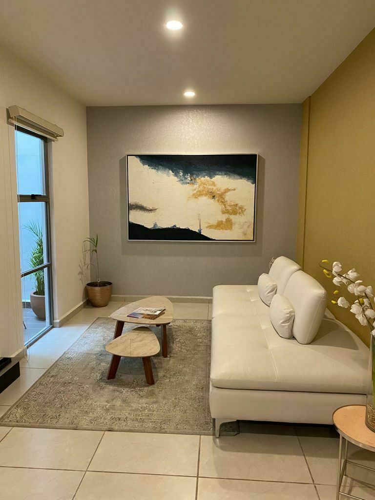 12 de 23: Estancia del Family room.