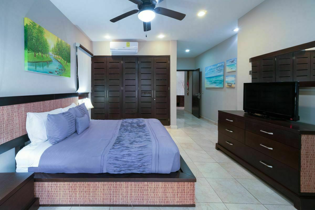 6 of 34: Guest suite 1 with king bed