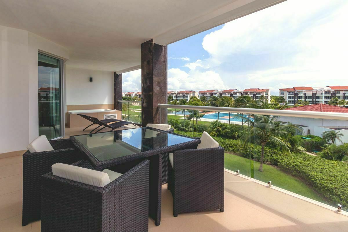 19 of 30: Your private terrace with pool views and Jacuzzi tub