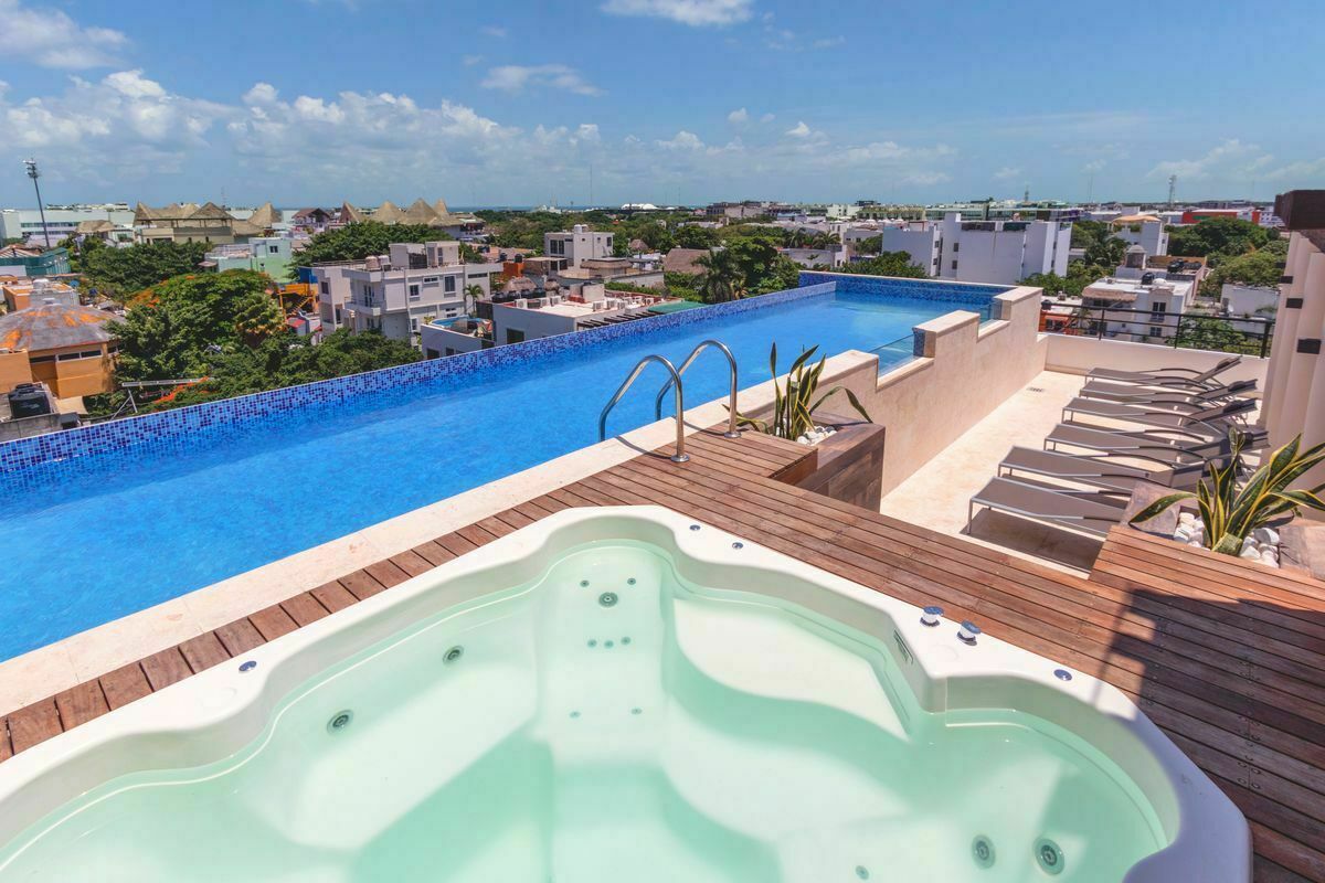 1 of 10: The iPlaya community rooftop terrace with pool and Jacuzzi