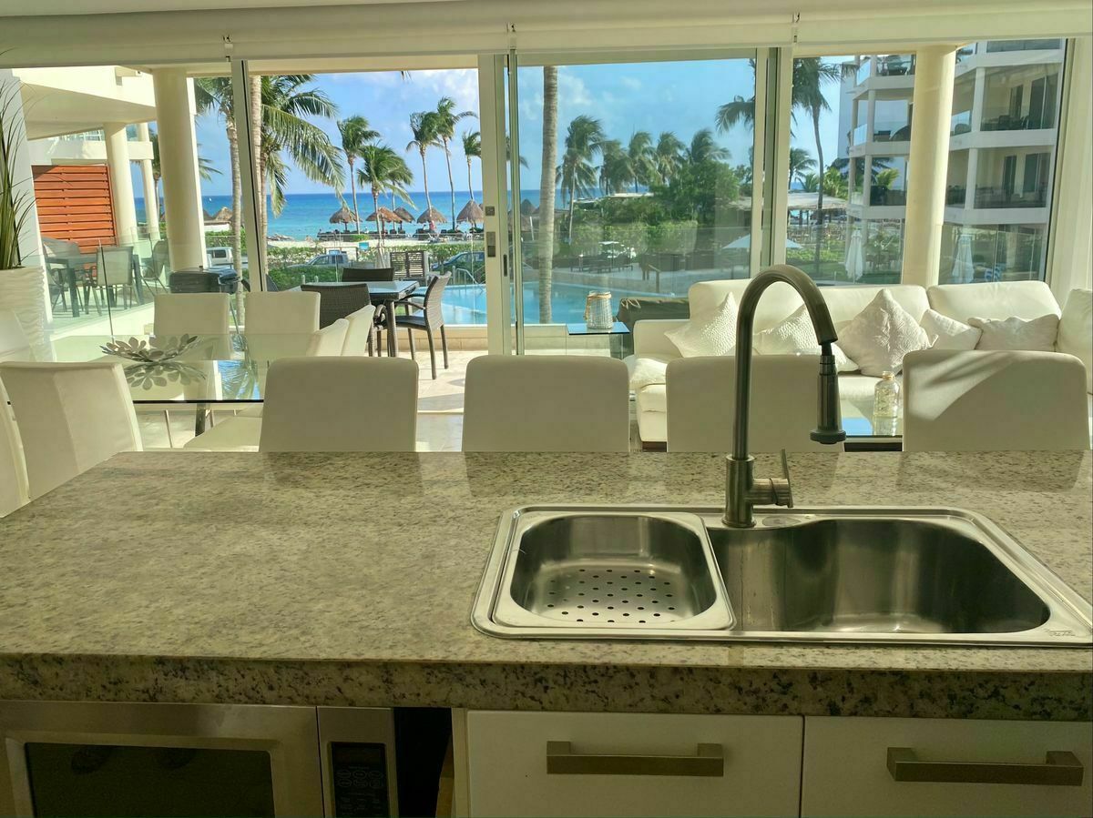 14 of 44: Your ocean view kitchen with attached laundry room