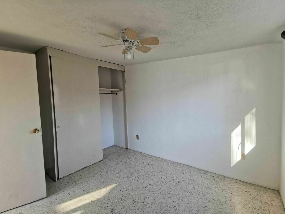 17 of 24: Habitación con Clóset y Ventilador