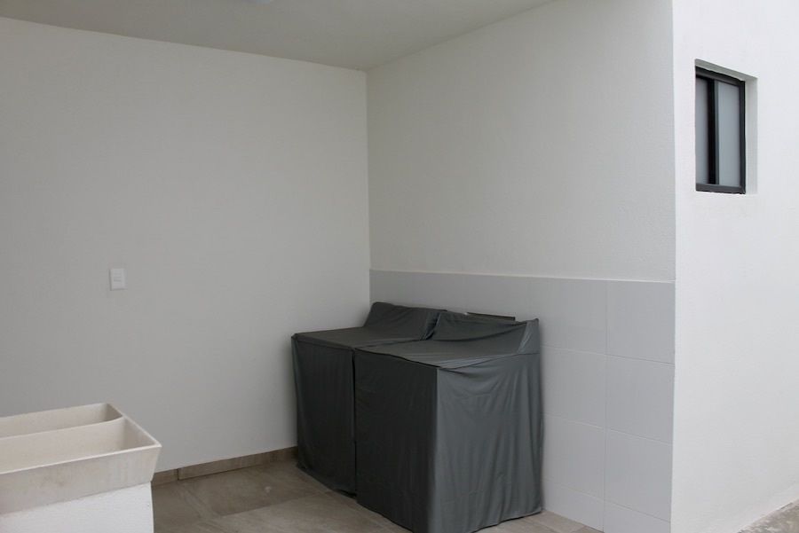 14 de 19: Lavadería