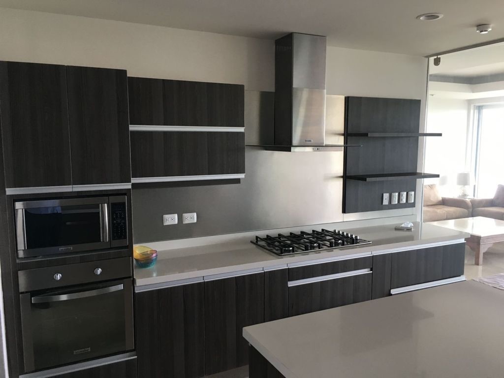 5 de 13: Cocina completamente equipada con campana.