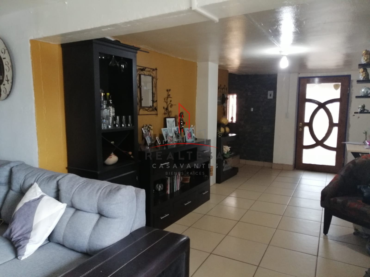 5 de 14: Área de sala, recibidor