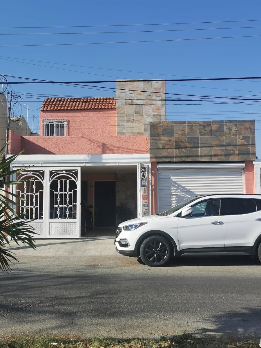 AMPLIA CASA EN AVENIDA CON LOCAL COMERCIAL
