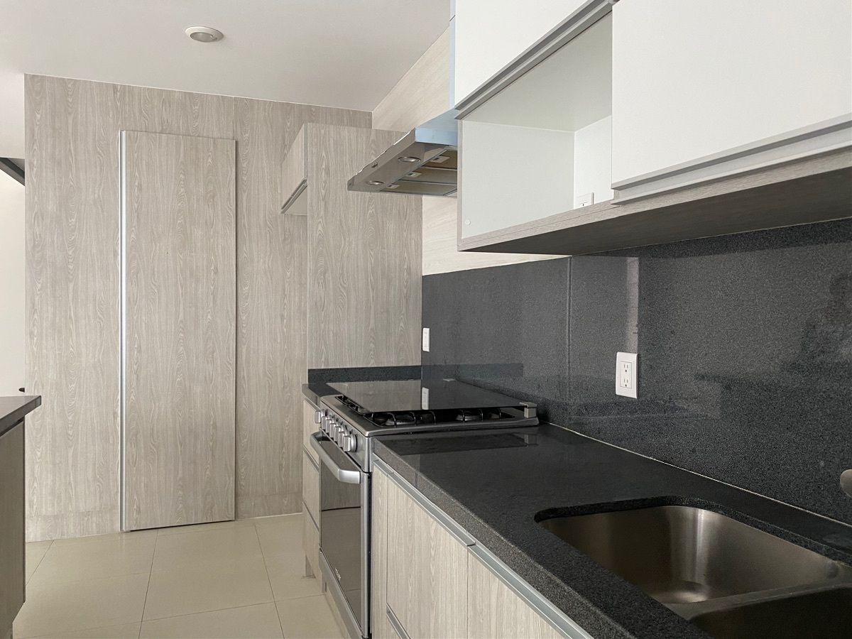 9 de 29: gabinetes y cajones amplios en la cocina