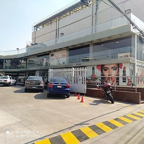 5 de 14: Estacionamiento exterior