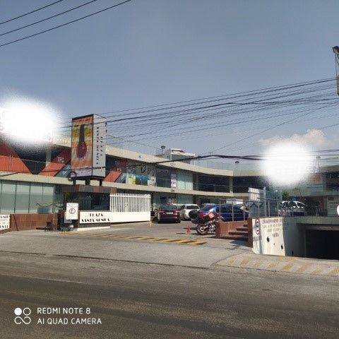 1 de 14: Frente de la Plaza