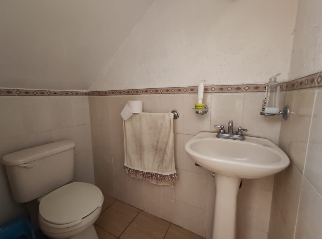 6 de 12: medio baño en planta baja
