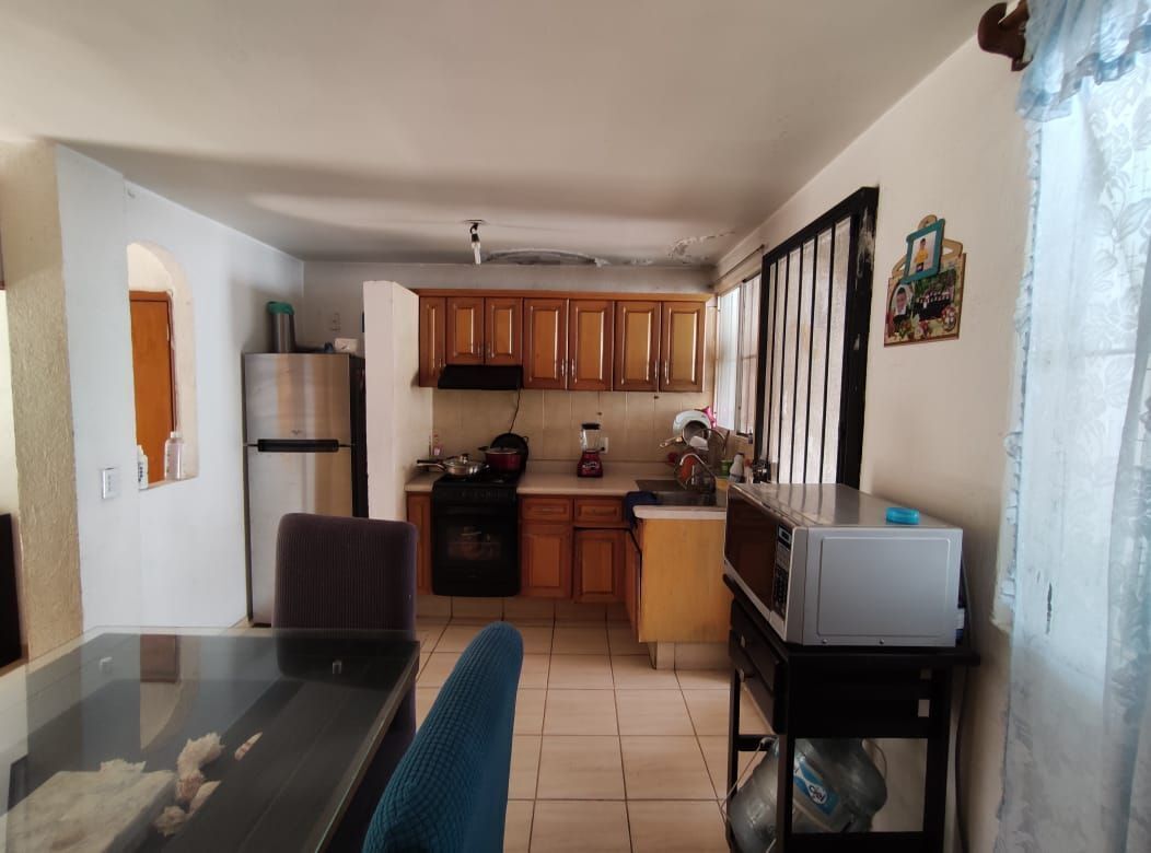 5 de 12: cocina comunica con patio