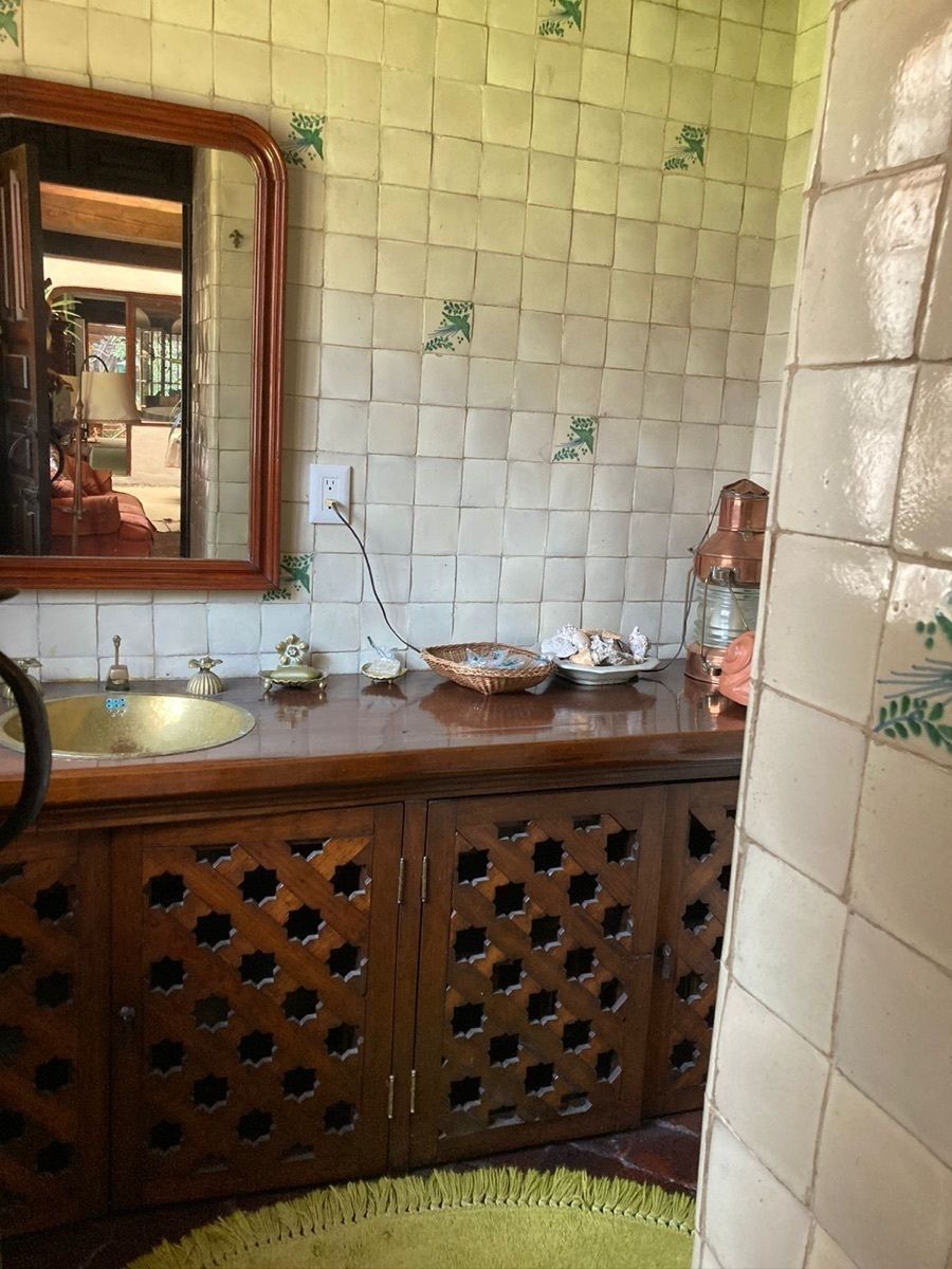 16 de 16: Baño de habitación secundaria