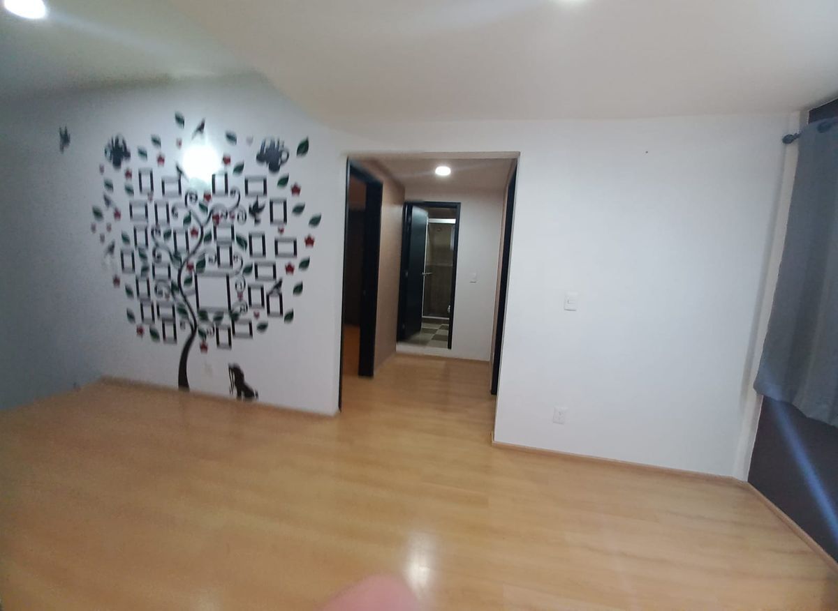 2 de 22: Vestíbulo con vista a rec y diseño árbol fotografico