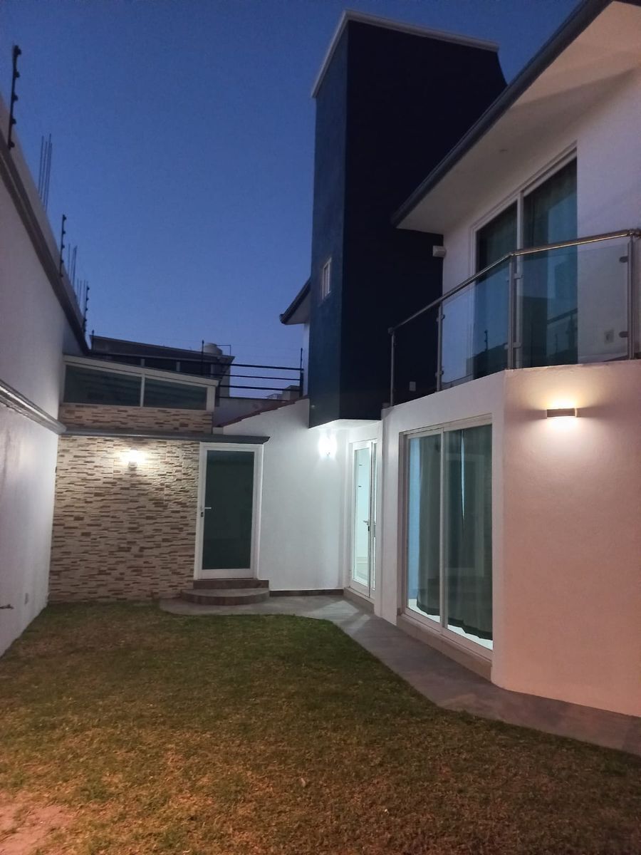 22 de 22: Jardín posterior y cuarto de lavado