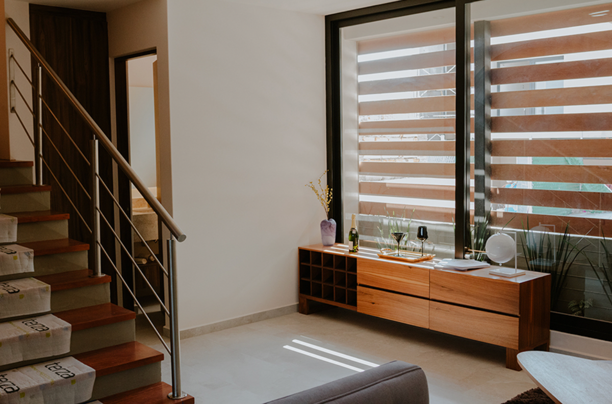 5 de 31: Sala, escaleras y recamara en planta baja