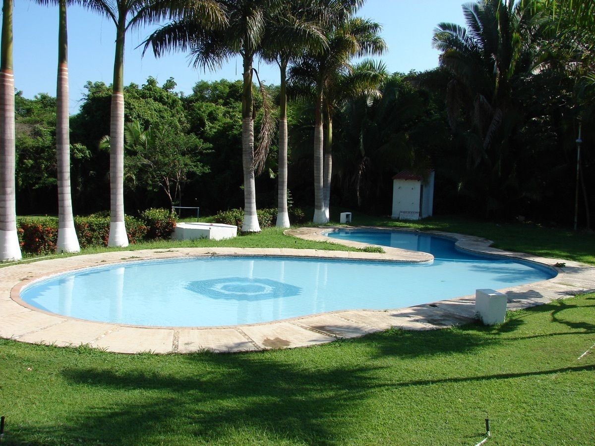 3 de 14: Alberca con chapoteadero para clientes