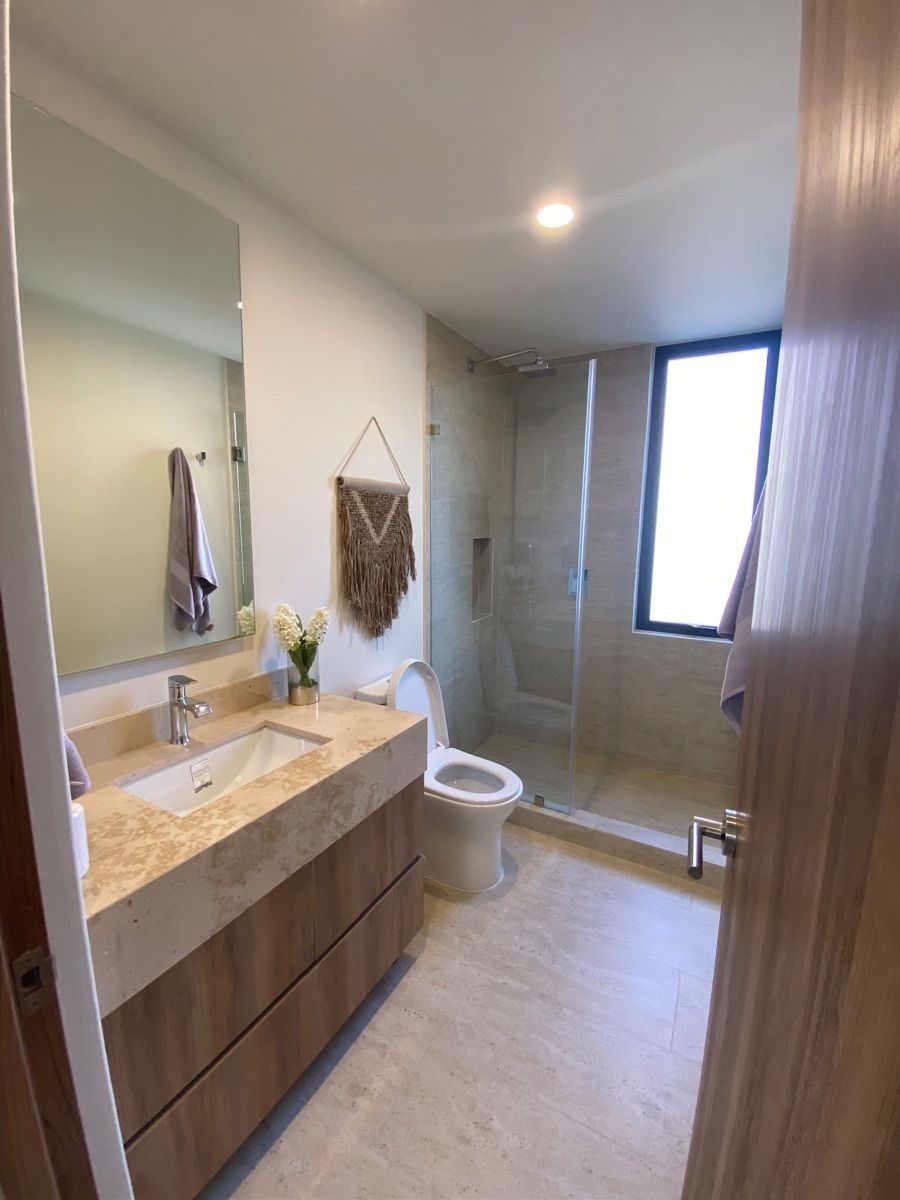 5 de 28: Baño compartido