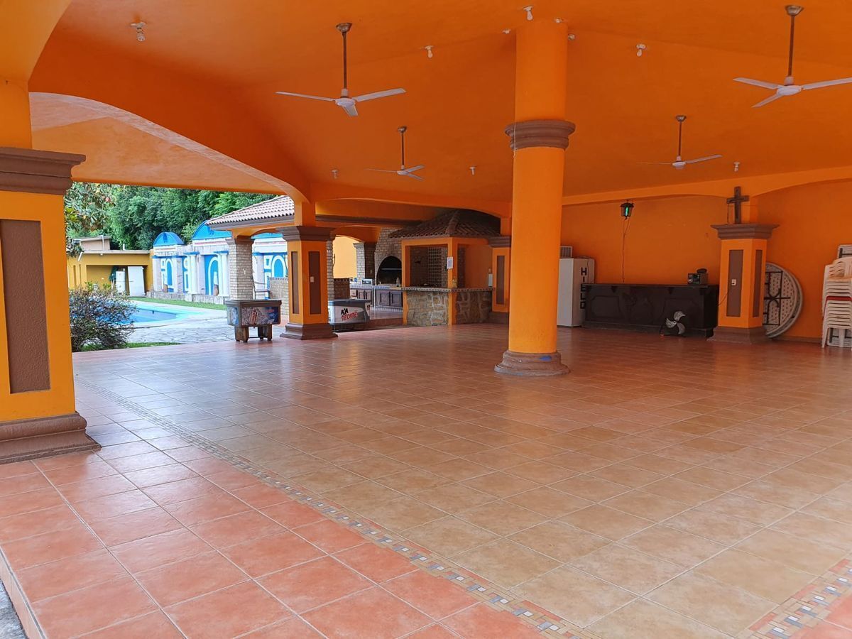 21 de 30: Palapa con asador