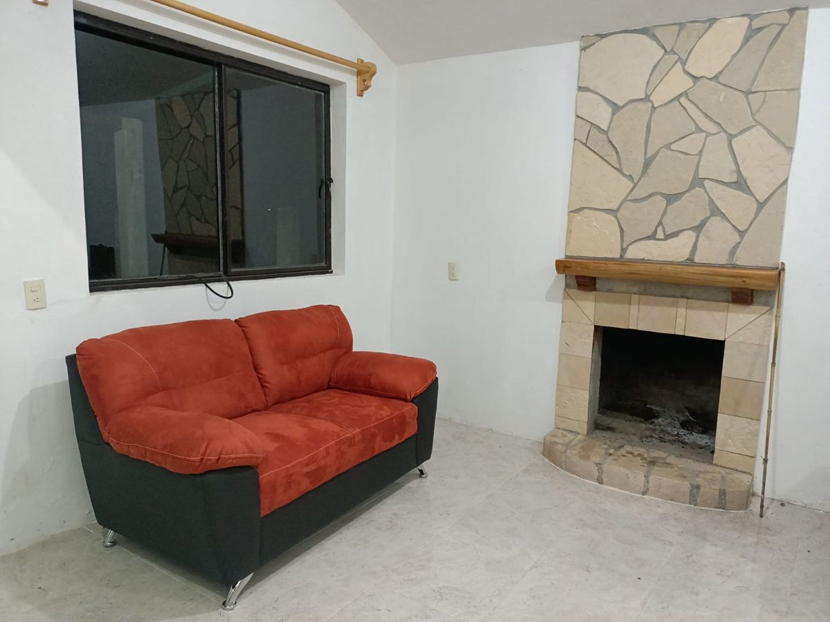 4 de 11: Sala con chimenea
